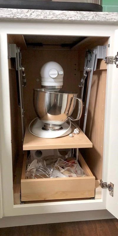 Base Cabinet for Stand Mixer storage, containing a standing mixer on the top shelf and mixing accessories on the bottom shelf. Kitchenaid Cabinet Lift, Kitchenaid Organization, Kitchenaid Shelf, Kitchenaid Cabinet, Kitchenaid Storage, Stand Mixer Storage, Kitchenaid Lift, Mixer Storage, Mixer Lift