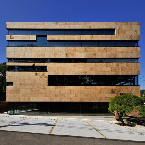 Strip windows create horizontal stripes across the facade of this office in Hokkaido, Japan, which won the Office category at World Architecture Festival 2015. Architecture Facade, World Architecture Festival, Commercial And Office Architecture, World Architecture, Office Building Architecture, Stone Facade, Building Architecture, Commercial Architecture, Design Exterior