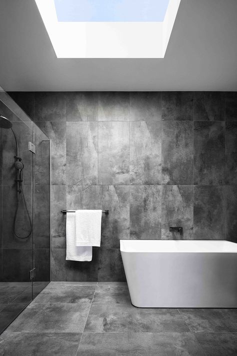 White And Charcoal Bathroom, Moody Ensuite, Townhouses Modern, Charcoal Grey Bathroom, Metal Banister, Charcoal Bathroom, Tapware Bathroom, Monochromatic Bathroom, Grey Bathroom Floor