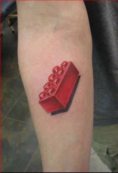 Red Lego to represent my relationship with my brother since we were young. He's my building block and is strong for me, and has a special place in my heart. I might get it on my foot, or my leg with a blue one underneath and possibly attached, or just under it to represent me :) :) Brick Tattoo, Henry Tattoo, Lego Tattoo, Dahlia Tattoo, Charm Tattoo, Fun Tattoos, Colorful Tattoos, Irish Tattoos, Blackout Tattoo