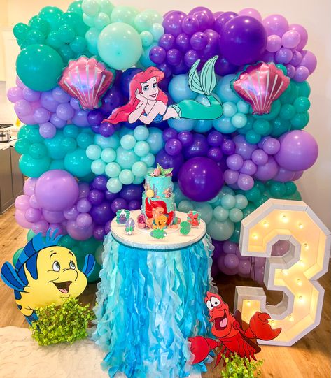 Little mermaid birthday party #thelittlemermaid #mermaid #mermaidparty #mermaidbirthdayparty #ariel #flounder #sebastian #thirdbirthday #birthday #birthdayparty #birthdaygirl #birthdayboy #birthdaypartyideas #birthdaydecoration #birthdaythemeideas #birthdaycakeideas #balloons #balloongarland #balloondecor #balloondecoration #balloonbackdrop #balloonartist #balloonwall #party #partythemes #partyideasforkids #partydecoration #underthesea #undertheseaparty #undertheseatheme #chrissierabalais Ariel Birthday Decorations, Ariel Balloon Garland, Little Mermaid 4th Birthday Party, Royal Birthday Party, Little Mermaid Birthday Party, Mermaid Pool Parties, Ariel Birthday Party, Mermaid Balloons, Mermaid Theme Birthday Party