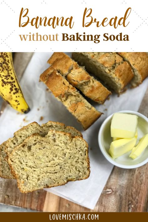 Slices of golden, soft banana bread are stacked on top of one another next to a sliced, golden brown loaf of banana bread without baking soda, a small white bowl of pale yellow butter squares, and an overripe, bright yellow banana with dark brown spots. Desserts Without Baking Soda, Few Ingredient Banana Bread, No Baking Soda Desserts, Simple Ingredient Banana Bread, Banana Bread Recipe Without Baking Soda Or Baking Powder, Banana Bread Recipe No Baking Powder, Easy Banana Bread Recipe Without Baking Soda, No Baking Soda Banana Bread, Easy Banana Bread No Baking Soda