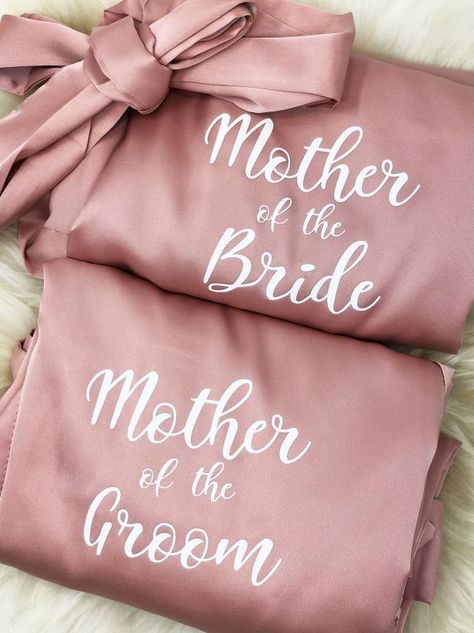 10 Ideas for Mother-of-the-Bride and Mother-of-the-Groom Gifts | HGTV Wedding Robes Bridesmaids, Bride And Mother, Mother Of The Groom Gift, Satin Robes, Mother Of The Groom Gifts, Bridal Party Robes, Bridal Robe, Wedding Robe, Bridesmaid Proposal Gifts