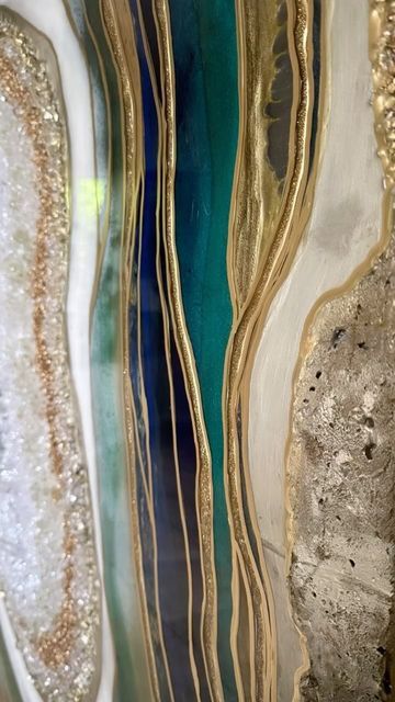 Faiza Ashraf | Abstract and Resin Artist 🇨🇦🇿🇦🇵🇰 on Instagram: "A striking blue, green & gold  #customgeodepainting 💚✨🫶🏼🦚💙  #resin #resinart #oceanblue #peacocblue #abstractpainting #abstractart #landscapeabstracts  #bluegold  #geodes #customresin  #luxuryinteriors  #moderninteriordesign #luxuryrealestate" Resin Artist, Blue Green Gold, Blue Agate, Artist On Instagram, Modern Interior Design, Luxury Real Estate, Green Gold, Luxury Interior, Blue Ocean