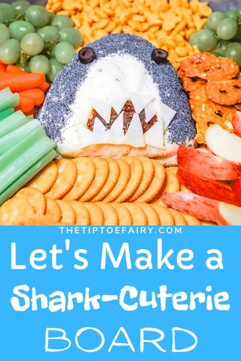 It's Shark Week! Make this adorably easy Shark-Cuterie Cheese Ball for a delicious Charcuterie Snack Board while you watch! #cheeseball #easyrecipes #appetizers #charcuterie #charcuterieboard Ocean Cheese Board, Shark Cheese Board, Shark Cheese Ball, Shark Charcuterie Board Ideas, Shark Snacks For Birthday, Shark Week Meal Ideas, Shark Week Snacks For Adults, Jaws Movie Night Food, Ocean Theme Appetizers