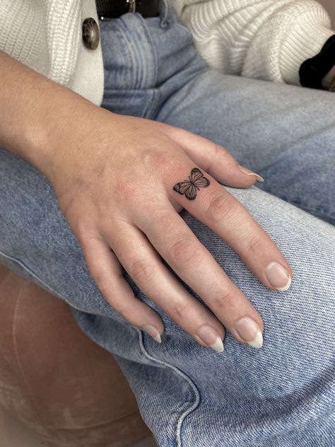 Finger Tattoo Butterfly, Finger Butterfly Tattoo, Butterfly Tattoo On Finger, Butterfly Tattoo Finger, Butterfly Finger Tattoo, Finger Butterfly, Tattoo Ideas Tiny, Tattoo Ideas For Men Hand, Symbol Tattoos With Meaning