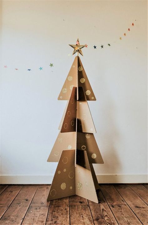 60 Creative Christmas Tree Ideas: Get Inspired and Festive this Holiday Season! Creative Christmas Tree Ideas, Turquoise Christmas Tree, Recycled Christmas Decorations, Recycled Christmas Tree, Cardboard Christmas Tree, Cardboard Christmas, Big Christmas Tree, Pallet Christmas Tree, Sustainable Christmas