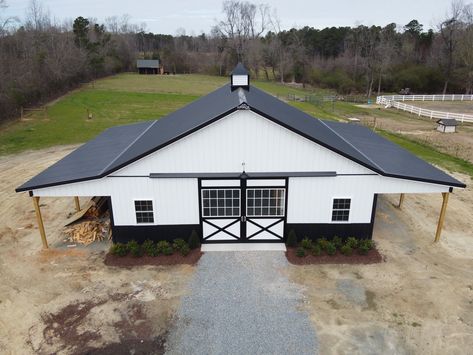 This 36x36x10 horse barn was built in Smithfield, NC, by Superior Buildings. Pole Barn Horse Barns, Horse Barn Exterior, Barn Designs Ideas, Small Horse Barn Plans, Metal Horse Barns, Small Horse Barn, Small Horse Barns, Cow Barn, Livestock Barn