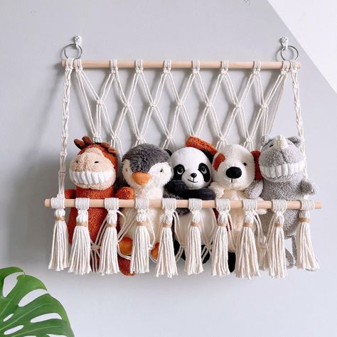 PRICES MAY VARY. Our plush toy storage net frees up floor space and displays stuffed animals in a stylish and organized manner. The handwoven, premium material construction with Bohemian tassel style adds a decorative touch to enhance room decor. Store stuffed animals, baby toys, large toys, balls, and more, keeping them organized and away from clutter. Handwoven from premium materials, this Bohemian style net is durable and makes a great decorative addition to any home. Hang the toy net in your Stuffed Toy Storage, Plush Display, Stuffed Animal Hammock, Hanging Net, Toy Net, Pola Macrame, Macrame Hammock, Toy Hammock, Kids Toy Organization