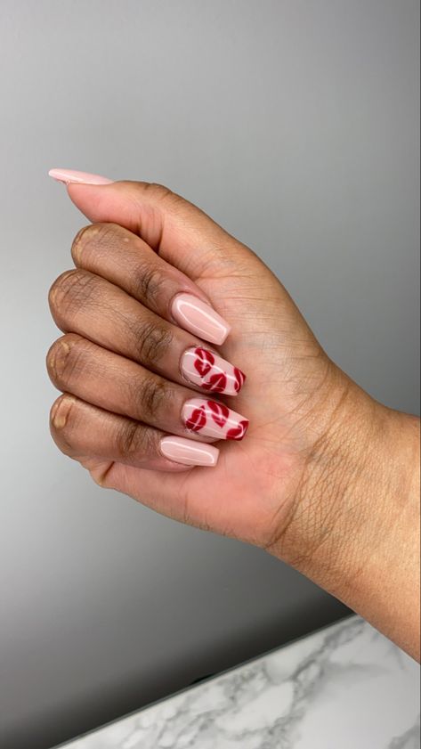 Nude acrylic nails with red lip accents Acrylic nails, nude nails, flame nails, summer nails, nail art, coffin nude nails, coffin flame nails, acrylic nail art, simple nail art, summer nail designs, lip nails, coffin acrylic nails Red Kiss Nail Designs, Red Lip Nails Design, Valentines Lips Nails, Red Nails With Kisses, Lip Nails Art, Valentines Nails Kisses, Red Lip Nails, Valentines Day Nails Lips, Kisses On Nails