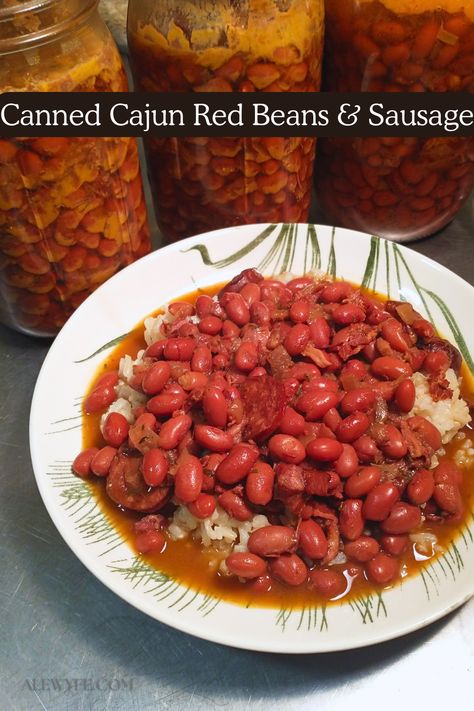 Looking for a meal prep canning recipe that is anything but bland? Try pressure #canning Cajun red beans and sausage for a ready-to-eat pantry meal with a kick!   It’s based on a tested Ball canning recipe, but we’ve kicked the flavor up a notch (or eleven), and improved the preparation instructions.   Heat up a jar of these meaty canned Louisiana-style red beans with smoky pork & andouille sausage and you’ll have a hearty, warming homemade dinner in almost no time at all. #mealprep #cajun Canning Red Beans And Sausage, Canned Red Beans Recipe, Red Beans And Sausage, Cajun Beans, Cajun Red Beans, Meal In A Jar, Apocalypse Prep, Andouille Sausage Recipes, Bean And Sausage Soup