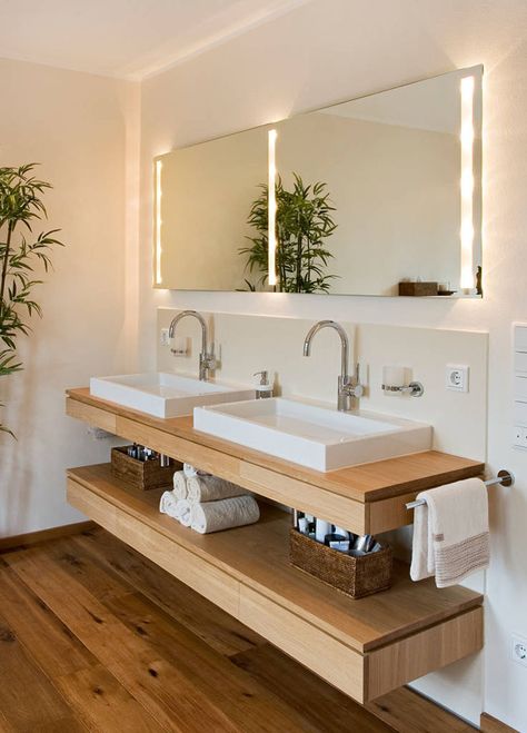 Bathroom Design Ideas - Open Shelf Below The Countertop // Dual sinks sit above a floating wooden shelf that's just the right height to store various lotions, potions, and creams as well as a stack of towels. Bathroom Storage Hacks, Bad Inspiration, Small Bathroom Storage, Trendy Bathroom, Bad Design, Bathroom Shelves, Bathroom Organization, Diy Bathroom, Amazing Bathrooms