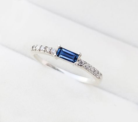 925 Sterling Silver Fashion Jewelry Beautiful Blue Sapphire Ring, This Ring is perfect gift for special love one. Sapphire is a very popular gemstone in Today's Fashion. M A T E R I A L S: * 925 Sterling Silver * Lab Created Sapphire * Main Stone Baguette 5x2.5 mm * Accented with tiny Cubic Zircon * Comes in our beautiful handmade gift box This simple and cute Baguette Sapphire Ring. Amazingly young look for daily casual wear. Beautifully craft handmade silver ring. Free Shipping! Occasion:  Par Beautiful Promise Rings, Blue Sapphire Wedding Ring, Feminine Jewelry, Stackable Rings Silver, Moissanite Engagement Ring Oval, Cz Rings Engagement, Wedding Rings Solitaire, Engagement Ring Shapes, Silver Jewelry Fashion