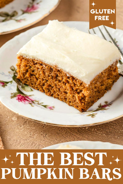 a white saucer with a pumpkin bar and cream cheese icing and a fork Gluten Free Pumpkin Bars Easy, Keto Pumpkin Cake With Cream Cheese, Gluten Free Pumpkin Bars With Cream Cheese Frosting, Gluten Free Dessert Bars Easy Recipes, Thanksgiving Sides Dairy Free, Gluten Free Pumpkin Squares, Gluten Free Pumpkin Cheesecake Recipe, Gluten Free Pumpkin Bars Cream Cheese, Almond Flour Pumpkin Bars