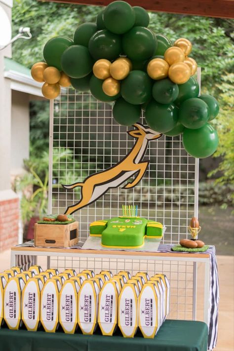 Rugby Ball shaped party boxes in Springbok Colours made by Chocnotes Rugby Themed Party, Rugby Birthday Party Ideas, Rugby Party Ideas Kids, Rugby Theme Party Ideas, Springbok Rugby Theme Party Ideas, Springbok Rugby Party, Rugby Party Ideas, Rugby Birthday Party, Unique Baby Shower Cakes