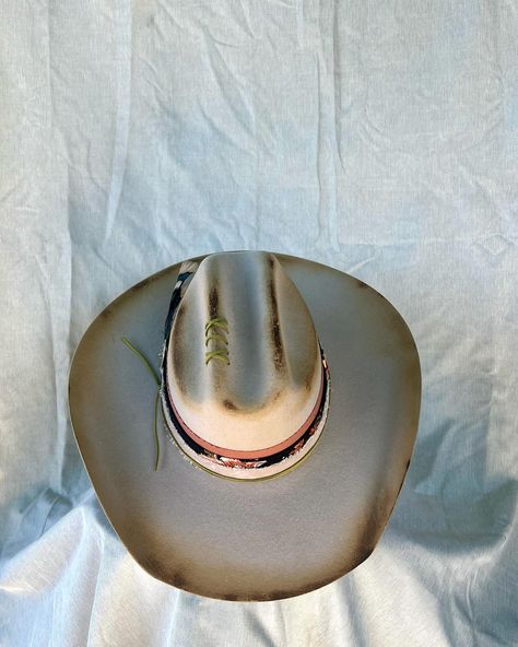 “Cow Belle” Custom burned and banded silver belly cowboy hat adorned with hand sewn details, matches, leather, silver concho, multiple fabrics and turkey feathers. Very good quality cashmere wool felt hat. One of a kind. Size: 7 $275 https://theroguecowpoke.etsy.com/listing/1807938475 Turkey Feathers, Felt Hat, Hats For Sale, Leather Silver, Cashmere Wool, Cowboy Hat, Custom Hats, Hand Sewn, Wool Felt