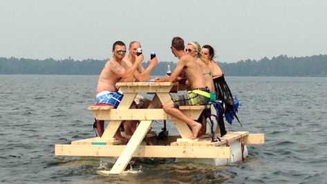 Floating picnic table is integrated with electric motor and wooden table that sails above water like a party barge. Picknick Table, Floating Picnic Table, Pedal Pub, Floating Cottage, Pontoon Ideas, Boat Restaurant, Party Barge, Picnic Table Plans, Wooden Picnic Tables