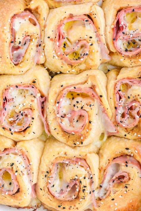 Hot ham and cheese pinwheels with crescent rolls are the perfect melty appetizer or lunch . These roll ups are quick and great for kids, plus taste delicious warm or cold. Try sliding a few in your kid's lunchbox, serve them as an appetizer for a party, or as a snack! Pinwheels With Crescent Rolls, Pinwheel Recipe, Hot Ham And Cheese, Copycat Drink Recipes, Velveeta Recipes, Ham And Cheese Pinwheels, Pinwheels Recipe, Campbells Soup Recipes, Healthy Egg Recipes