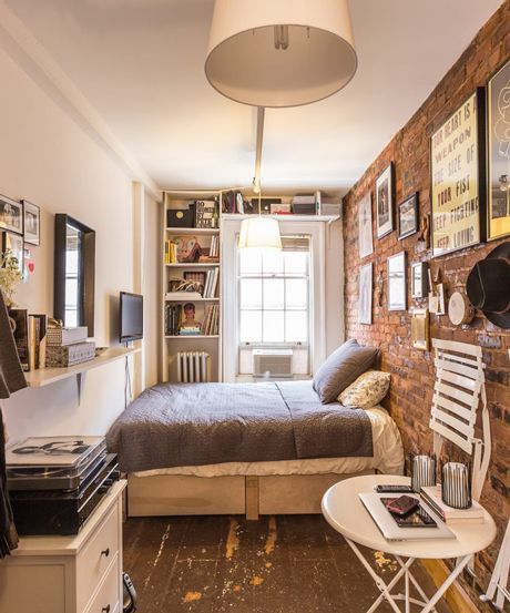 this is how to make a small space work for you, via @Refinery29 Appartement New York, Micro Apartment, Deco Studio, Boho Cottage, Brick Walls, Tiny Spaces, New York Apartment, Tiny Apartment, Tiny Bedroom