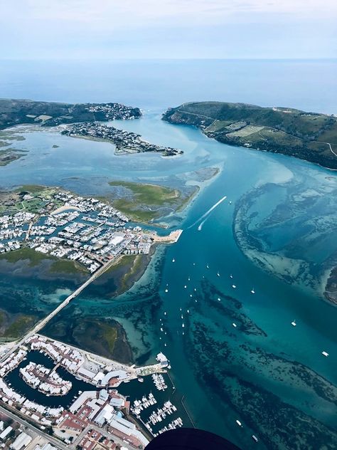 Another fine aerial shot of the Knysna estuary. Photo by Gustav duToit. The Heads in center background. Coming forward - 1st Leisure Isle, then part of Thesen Islands, then Knysna Quays, then part of the Yacht Harbour. Knysna South Africa, Knysna, South Africa Travel, Cape Town South Africa, Beaches In The World, Outdoor Swimming, Most Beautiful Beaches, Southern Africa, New Town