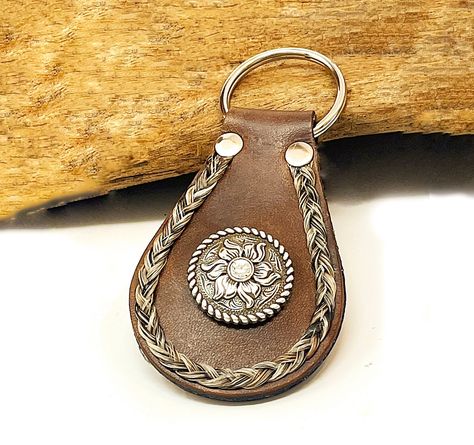 Excited to share the latest addition to my #etsy shop: Custom Leather Horsehair Keychain with Crystal Concho, Horse Memorial, Equestrian Gift https://etsy.me/3gy9JhQ #brown #petloss #silver #horsehair #horsejewelry #customhorsehair #horselovergift #equestriangift #hors Horsehair Keychain, Horse Hair Ideas Memorial, Horse Hair Braiding, Hair Keepsake, Horse Hair Bracelet, Horse Memorial, Horse Hair Jewelry, Rugged Leather, Equestrian Gifts