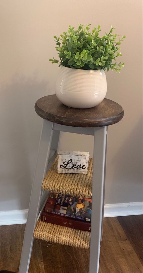 Diy Stool Table, Mini Stool Decor Ideas, Living Room End Tables Diy, Bar Stool Plant Stand, Bar Stool Upcycle, Wooden Barstool Makeover Diy, Barstool Repurpose, Repurposed Bar Stool, Repurpose Bar Stool Ideas