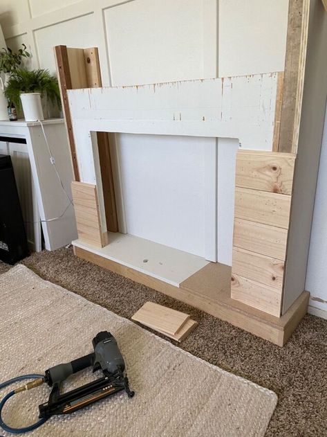 Fireplace Mantel Frame, Faux Built In Fireplace, Faux Mantle Diy, Mock Fireplace, Diy Wood Mantle, Build A Faux Fireplace, Fake Fireplace Mantel, Fireplace With Cabinets, Thrifting Hacks