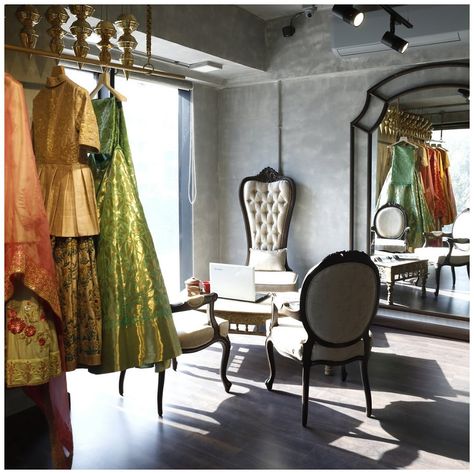 Admire the play of sunlight against concrete washed walls and antique brass accents, creating an ambiance of timeless elegance. Refurbished antique cane furniture speaks of old Ahmedabad, while whimsical artefacts add a touch of charm. . . . . boutique, boutiqueinterior, interiordesign, interiorstyling, interiordesigner, interiordesigninspiration, boutiqueclothing, indiandesigner, indianfashion, retaildesign, retailinteriors, fashionboutique, Anoli Shah, InteriorDesign, FashionMagic, Designer... Old Ahmedabad, Interior Design India, Iconic Armchairs, Retail Fixtures, Cane Furniture, Interior Design Work, Wooden Mirror, Store Fixtures, Boutique Interior