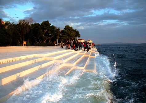 Back in 2005, this organ, that is 230 ft long, was designed by a Croatian architect and it is capable of transforming the rhythm of waves into actual music. Sea Organ, Water Architecture, Zadar Croatia, Park Playground, Zadar, Urban Planning, Zagreb, Dubrovnik, Urban Landscape