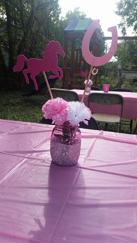 Centerpieces for cowgirl party! Love how these came out! #diy #cowgirl… Cowgirl Party Ideas Kids, Diy Cowgirl Birthday Party Decorations, First Rodeo Centerpiece Girl, My First Rodeo Centerpieces Girl, Cowgirl Centerpieces Table Decorations, My First Rodeo Birthday Girl Centerpiece, Horse Centerpiece Ideas, Pink Cowgirl Party Centerpiece, Cowgirl Decorations Party