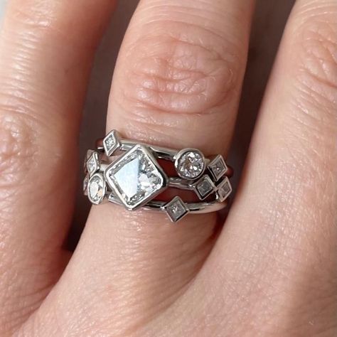 Let's talk Princess-cut diamonds.⁠ ⁠ The name "Princess" was coined in 1979 by diamond cutter Betzalel Ambar. It was chosen to convey the regal and sophisticated look of this square or rectangular-shaped stone. Unlike traditional round cuts, the Princess cut features pointed corners and over 50 facets, giving it a stunning sparkle that rivals even the most classic designs.⁠ ⁠ Princess-cut diamonds can add a real touch of elegance and interest to a Legacy design, but including them along with ... Jewellery Remodelling, Legacy Design, Sophisticated Look, Round Diamond Ring, Left Out, Princess Cut Diamonds, The Princess, Let's Talk, Princess Cut