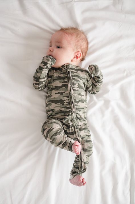 This soft and snuggly camo zipper romper makes the perfect going home outfit or gift. Made from bamboo viscose, which is lightweight and ultra-soft. Features a 2-way zipper that runs from the neck to the ankle to make those diaper changes super easy! Featuring fold over cuff to keep baby from scratching and to keep their little hands warm. *Size up if in between sizes. Care: Wash on cold, delicate and air dry or dry low. Baby Profile, Lil Nugget, Playsuits Outfit, Soft Features, Characters Inspiration, Witchcraft Books, Baby Lounger, Custom Onesies, Going Home Outfit