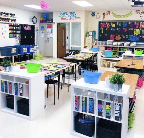 Classroom Game Storage, Classroom Table Organization Desk Arrangements, Classroom Setup With Tables First Grade, Classroom Table Storage Student, Teacher Desk Arrangement Elementary, Kindergarten Classroom Table Storage, Classroom Tables Organization, Classroom With Tables Instead Of Desks, 2nd Grade Classroom Setup Desks