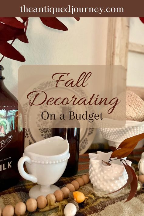 a shelf styled with vintage and thrifted finds for Fall Tabletop Fall Decor Ideas, Buffet Fall Decor Ideas, Vintage Fall Decor Kitchen, Budget Friendly Fall Decor, Fall Vintage Decor, Fall Vignettes Decorating Ideas, Fall Decor With Vintage Items, Cozy Fall Decor Kitchen, Fall Mantle Decor 2024