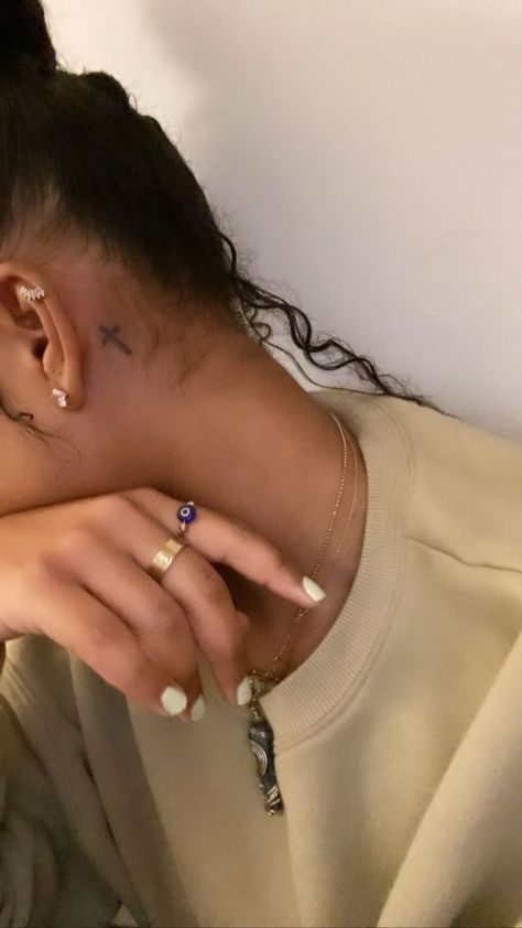 Tattoos Small Black Women, Small Tats Behind The Ear, Small Cute Neck Tattoos, Small Wrist Tattoos Black Women, Red Cross Neck Tattoo, Small Neck Tattoos Black Woman, Small Hidden Tattoos Black Women, Cross Behind Ear Tattoo Black Women, Christian Tats Women