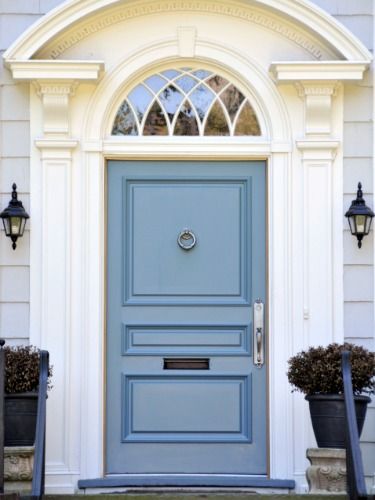 This soft shade highlights the true character of this colonial-style home. See more colorful doors >> Glass Transom, Blue Front Door, Front Door Paint Colors, Mail Slot, Door Colors, Black Planters, Door Paint Colors, White Door, Door Casing