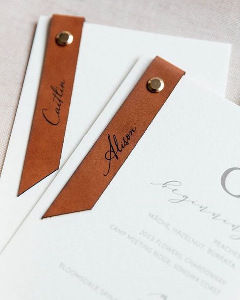 Etched leather tags on beautiful white and grey embossed wedding menus. Etched leather by Yonder Design (@yonderdesign) • Instagram photos and videos featured on @marthastewartweddings @alison_events Safe The Date, Leather Menu, Leather Tags, Stationery Inspiration, Leather Wedding, Invitation Inspiration, Wedding Place Cards, Wedding Stationary, Wedding Menu