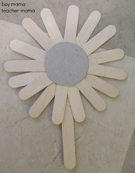 Popsicle Stick Sunflowers  need: cardboard, popsicle sticks halved, 1 whole popsicle stick, paint. Lolly Stick Craft, Popsicle Stick Art, Popsicle Art, Diy Popsicle Stick Crafts, Wooden Craft Sticks, Popsicle Crafts, Intelligence Service, Boy Mama, Stick Art