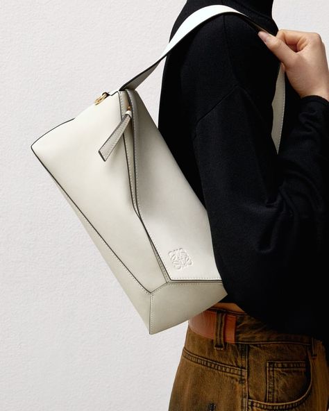 LOEWE’s Instagram post: “Over the shoulder The Puzzle Hobo in Soft White leather. loewe.com #LOEWE #LOEWEpuzzle” Loewe Puzzle Hobo, Hobo Bag Outfit, Loewe Puzzle Bag, Loewe Puzzle, Puzzle Bag, Loewe Bag, Soft White, Michael Kors Jet Set, Hobo Bag