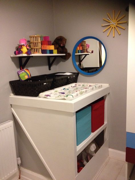 Home made built in changing table/ storage over bulk head. Bulkhead Nursery Ideas, Bulkhead In Bedroom, Stair Bulkhead Ideas Nursery, Stair Box In Bedroom Ideas Storage, Bulk Head Storage, Bulkhead Bathroom Ideas, Storage Over Stairs Bulkhead, Bulkhead Storage Ideas, Stairbox Ideas