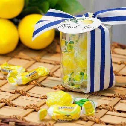 These cute and citrusy lemon-themed party favors are great thank-you gifts for an Italian holiday-inspired wedding, shower, or birthday party. Get details and more inspiration now at fernandmaple.com! Amalfi Coast Party Favors, Lemon Shower Favors, Lemon Themed Favors, Lemon Theme Party Favors, Italian Party Favors Ideas, Positano Theme Party Decorations, Summer Party Favors For Adults, Italian Lemon Baby Shower Theme, Italian Party Favors