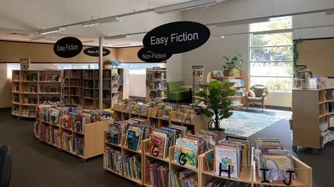 lib9 School Library Signage, Hanging Library, Middle School Library, Library Signage, School Library Design, Library School, Middle School Libraries, Library Signs, Metal Shelving Units