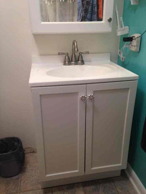 I came up with this idea for a removable tile backsplash for our bathroom because I wasn't sure how long it would be until we would replace our bathroom vanity. Backsplash and Vanity are still going strong after several years, now! Before: Here is our plain bathroom sink. If you hang around me very long, you will find out that I don't like leaving things plain for very long. I searched and searched and finally found some gorgeous accent tile for our shower renovation. And there was e… Bathroom Vanity Backsplash, Backsplash For Bathroom, Plain Bathroom, Removable Backsplash, Removable Tile, Vanity Backsplash, Shower Renovation, Barn Wall Art, Diy Dresser Makeover