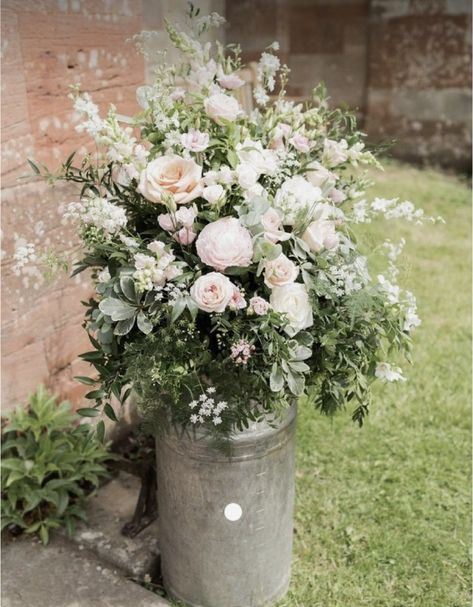 Flowers Equipment: Tools: ◦ Secateurs x 2 ◦ Floral scissors x 2 ◦ Snips x 2 ◦ Floral tape x 2 ◦ Floral wire ◦ Twine Flower containers: ◦ Window boxes x 5 ◦ Jars x 6 for window boxes ◦ Jars/bottles x 5 for tables x 10 ◦ Big white vase ◦ Vase/containers to hold bouquets x 6 ◦ Buckets x 20 ◦ Tubs x 3 ◦ Extra jars for conditioning x 10 ✓ Milk churns x 2 (at bleak farm already) Extras: ◦ Ellie’s bouquet ribbon (sage) ◦ Bmaids bouquet ribbon (ivory) ◦ Buttonhole ribbon? ◦ Buttonh Country Wedding Reception, Romantic Summer Wedding, Church Wedding Flowers, Elegant Summer Wedding, Milk Churn, Flower Containers, Church Wedding Decorations, Fragrant Garden, Barn Wedding Decorations