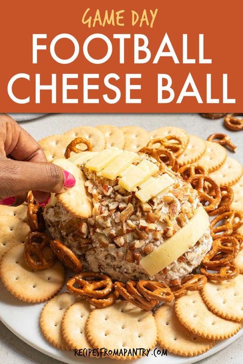 Hosting a tailgating party or watching the big game? Then your guests will love this delicious Cream Cheese Bacon Ranch Football Cheese Ball. This creamy football shaped cheese ball requires minimal prep, can be made ahead and refrigerated for easy entertaining. It's the perfect football appetizer, finger food and party food for your Super Bowl party, football parties, potlucks, picnics & birthday parties. Get the Bacon Ranch Cheese Ball recipe. #cheeseball #appetizer #superbowl #tailgate Bengals Themed Food, Football Cheeseball, Football Appetizers Easy, Bacon Ranch Cheese Ball Recipe, Egg Recipes For Lunch, Thanksgiving Party Food, Weight Watchers Crock Pot Recipes, Easy Make Ahead Appetizers, Vegetarian Slow Cooker Recipes