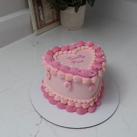 Pink heart cake with a touch of gold 🩷👑 - Cake Details - Size: Mini 6” (2 layers) Add-ons: Pearls (edible) + glitter dust (edible) #emmacakes #emmacakesseattle #customcakesseattle #heartcakesseattle #heartcake #vintagecake #seattlecakes #seattlebakery Layer Cake Rose, Mini Heart Cake, Pink Heart Cake, Barbie Bday, Edible Glitter Dust, 19th Bday, Cake Rose, Shaped Cakes, Heart Cakes