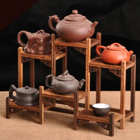 Wood Display Stand $62.32 bit.ly/3hCYQMU Tea Pot Crafts, Black Display Cabinet, Teapot Crafts, Wood Miniature, Chinese Kung Fu, Wood Display Stand, Crystal Shelves, Pot Crafts, Kung Fu Tea