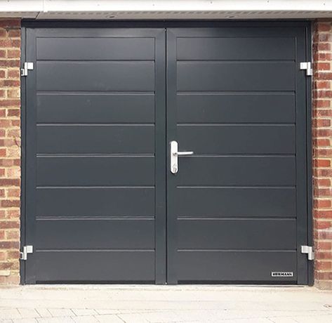 Hormann Horizontal M Ribbed Side Hinged Garage Door Finished In Anthracite Grey & Installed By Our New Malden Branch.  If you’re looking to replace your garage door, we supply & fit all types including both side hinged & sectional garage doors. Call 0800 716 569 to speak with one of our experts or alternatively, visit www.accessgaragedoors.com to book your free survey. #sidehingedgaragedoor #Hormann #Upminister Horizontal Garage Door, Side Hinged Garage Doors Uk, Hormann Garage Door, Garage Doors Uk, Hinged Garage Doors, Side Hinged Garage Doors, Metal Garage Doors, Garage Door Hinges, Grey Siding