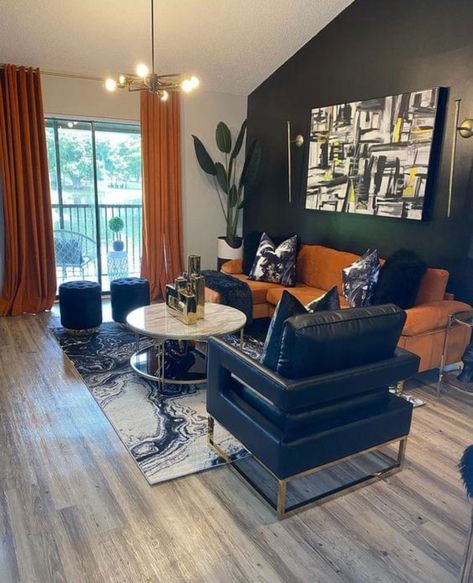 Cognac Home Decor, Atrium Decorating Ideas, Orange Black And Gold Living Room, Boujee Apartment Living Room Black, Apartment Decorating Black People, Black Women Living Room Ideas, Black And Gold Boho Living Room, Black And Orange Living Room Ideas, Rust And Black Living Room