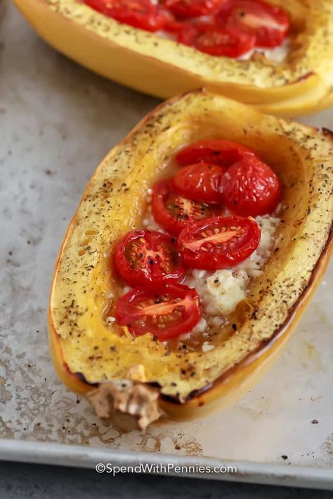 Feta Spaghetti Squash is a keto lover's dream! It's a low-carb meal with sprinkles of cheese and fresh tomatoes, perfect for the whole family! This meatless meal is also easy on the wallet, and easy to make!  #spendwithpennies #spaghettisquashboats #maindish #recipe Spaghetti Squash Cheese, Spaghetti Squash With Roasted Tomatoes And Feta, Spaghetti Squash With Feta Cheese And Tomatoes, Spaghetti Squash And Tomato Recipes, Spaghetti Squash And Feta, Spaghetti Squash Recipes With Feta And Tomatoes, Feta And Tomato Spaghetti Squash, Feta Cheese Spaghetti Squash, Spaghetti Squash Feta Bake